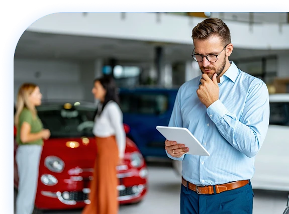 man deciding on buying car man deciding on buying car